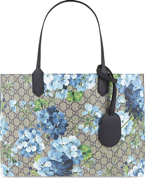 gucci tote blue blooms|Gucci Bloom toiletry pouch.